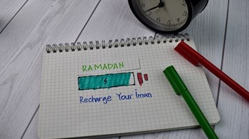"Recharge Your Iman" Ramadan Kareem Quotes written on a book.jpg