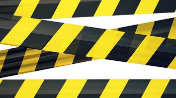 black-and-yellow-plastic-barrier-strips-in-an-x-shape-and-accross-top-and-bottom.jpg.jpg