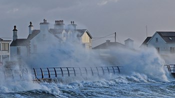 large-waves-on-shore-breaking-over-metal-fencing.jpg